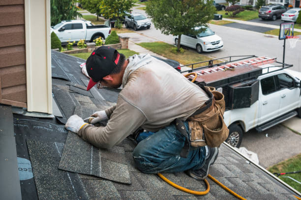 Professional Roof Replacement technician working in Elmaton, TX